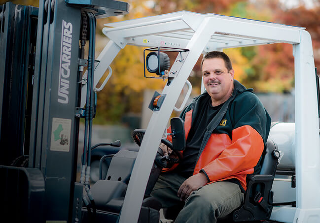 Man Driving Unicarriers Forklift